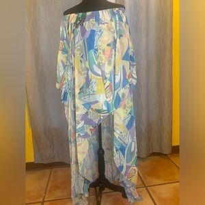 Asymmetrical dress with flair sleeves